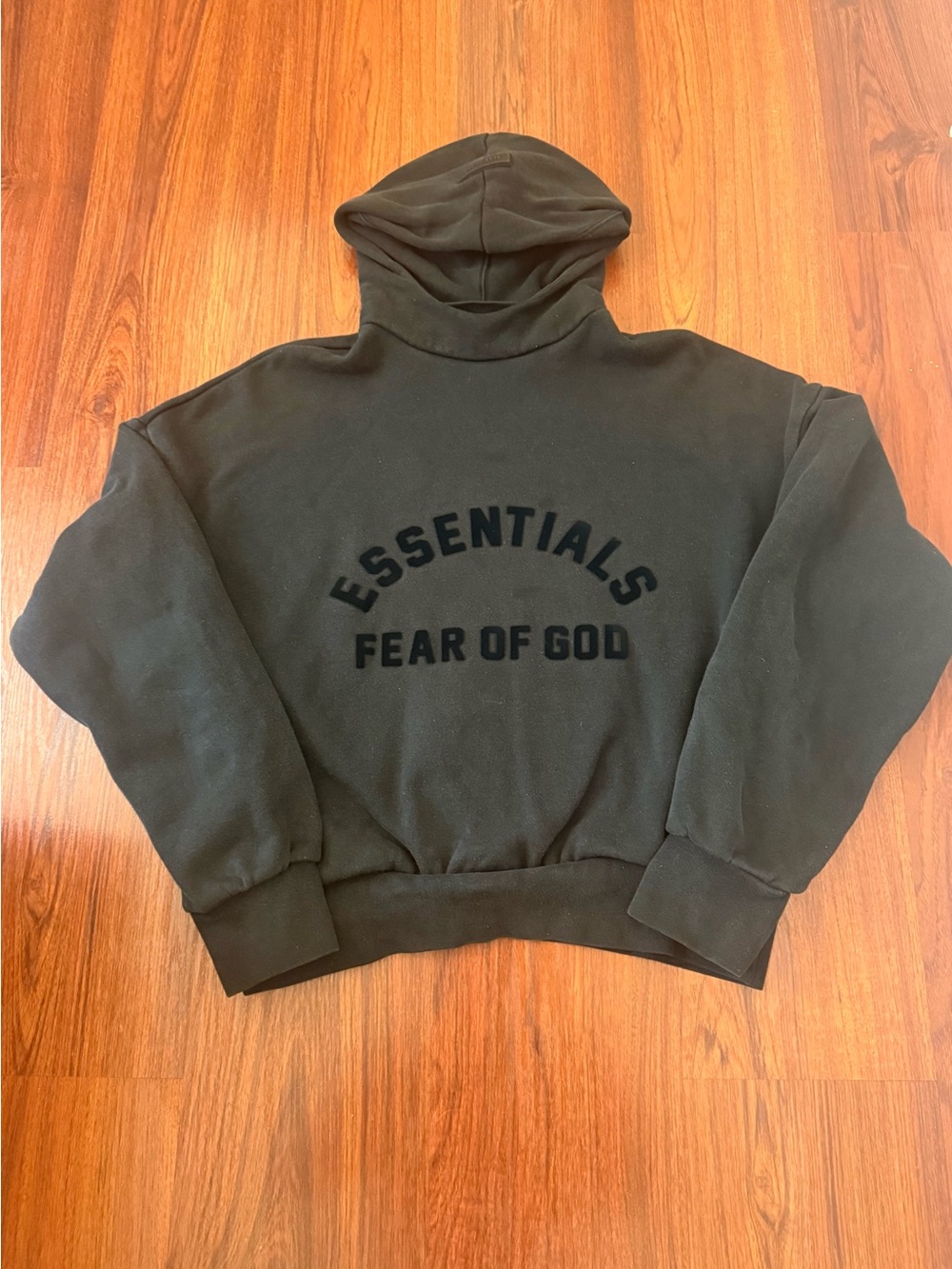 Fear of God Essentials Black Pullover Hoodie with Raised Logo